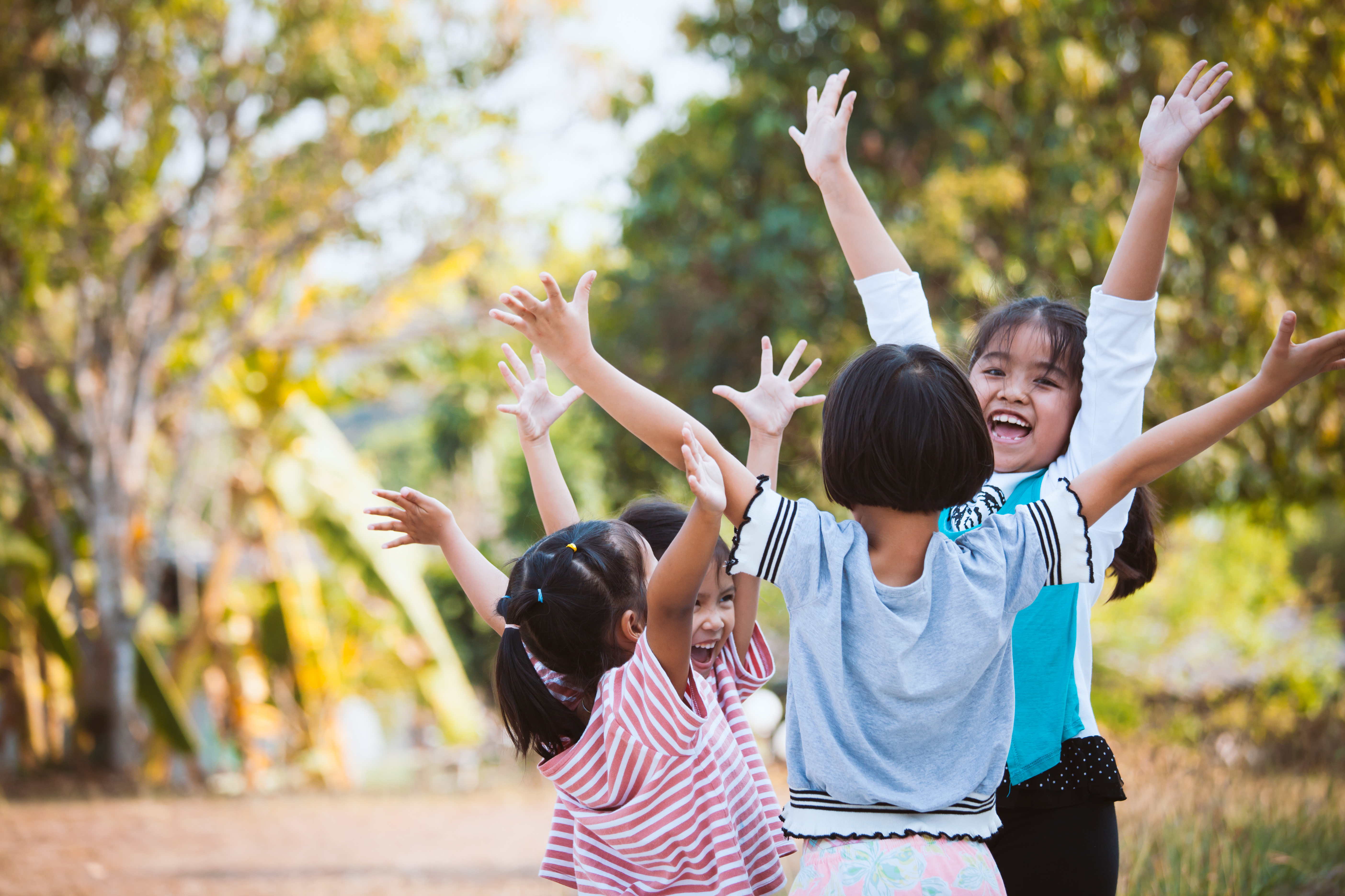 kids playing outdoors in the sun