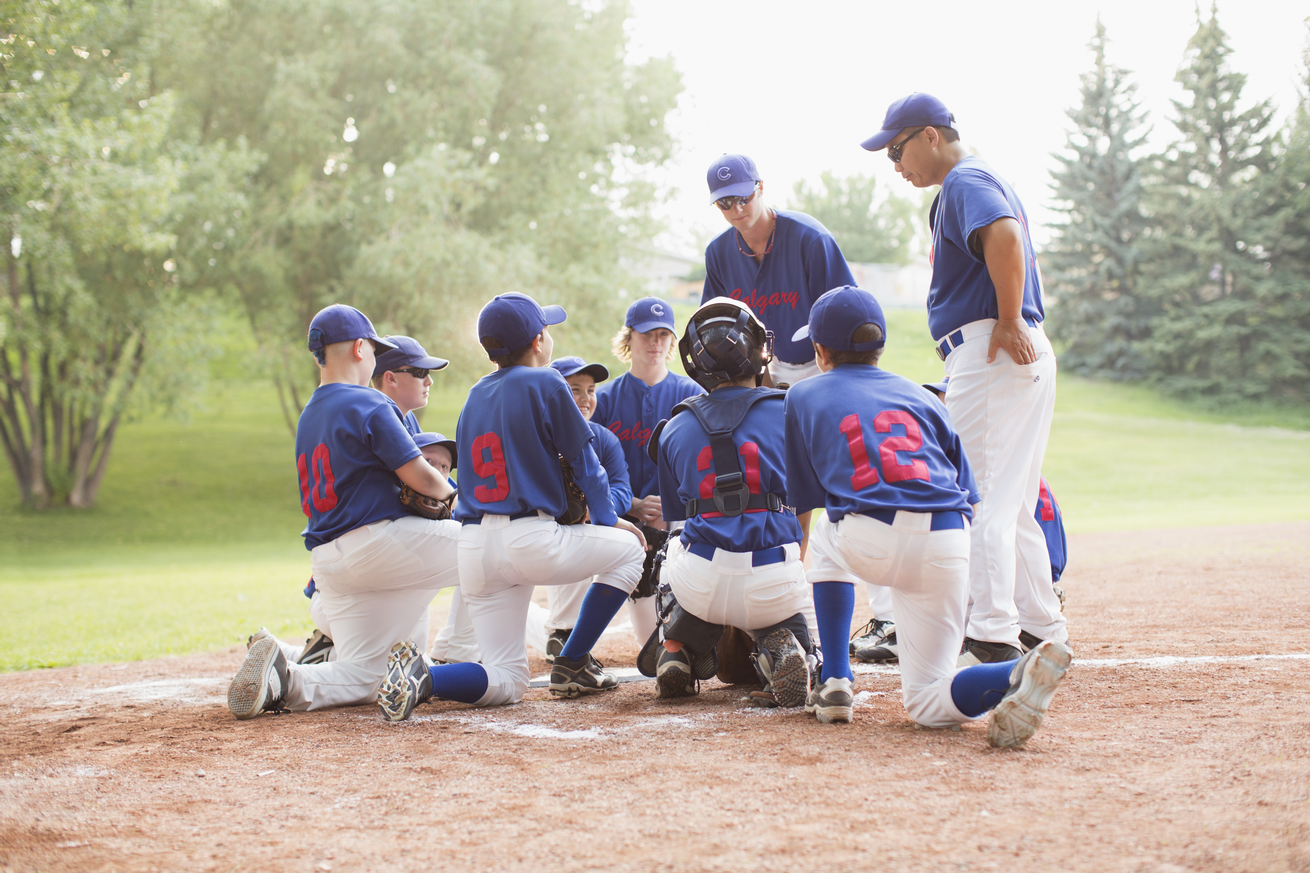 baseball team with coaches