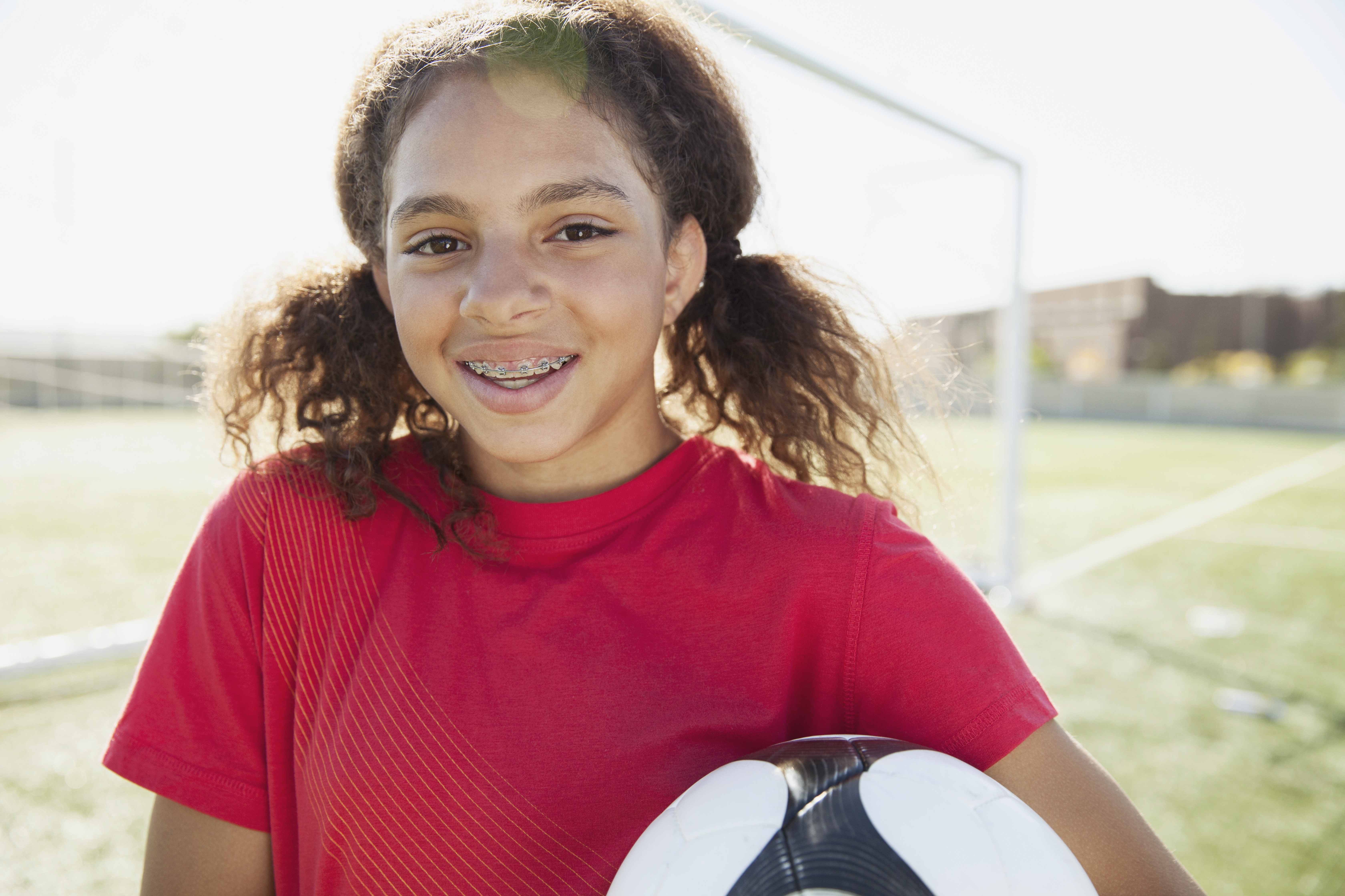 girl with soccer ball