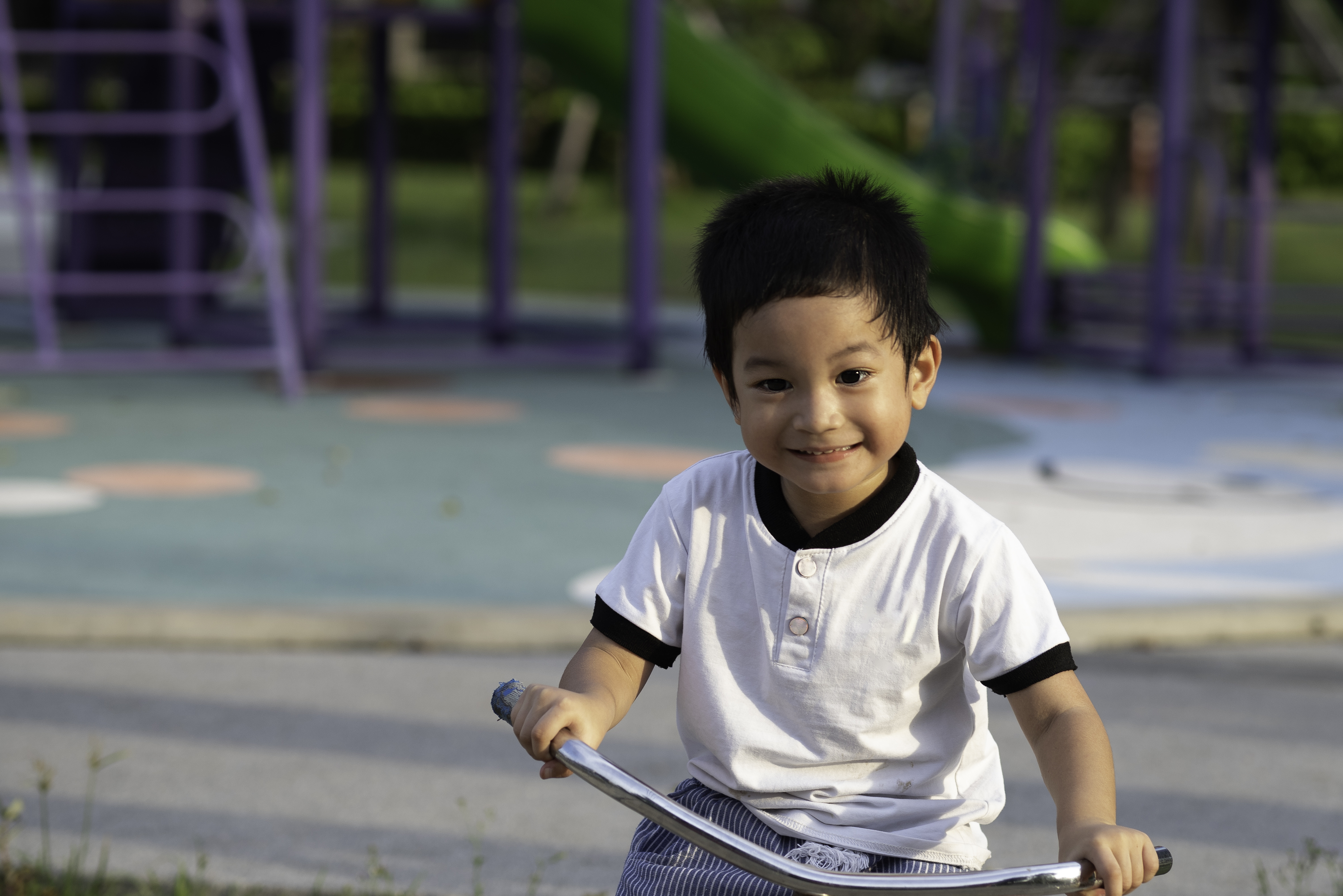 little boy on a bike