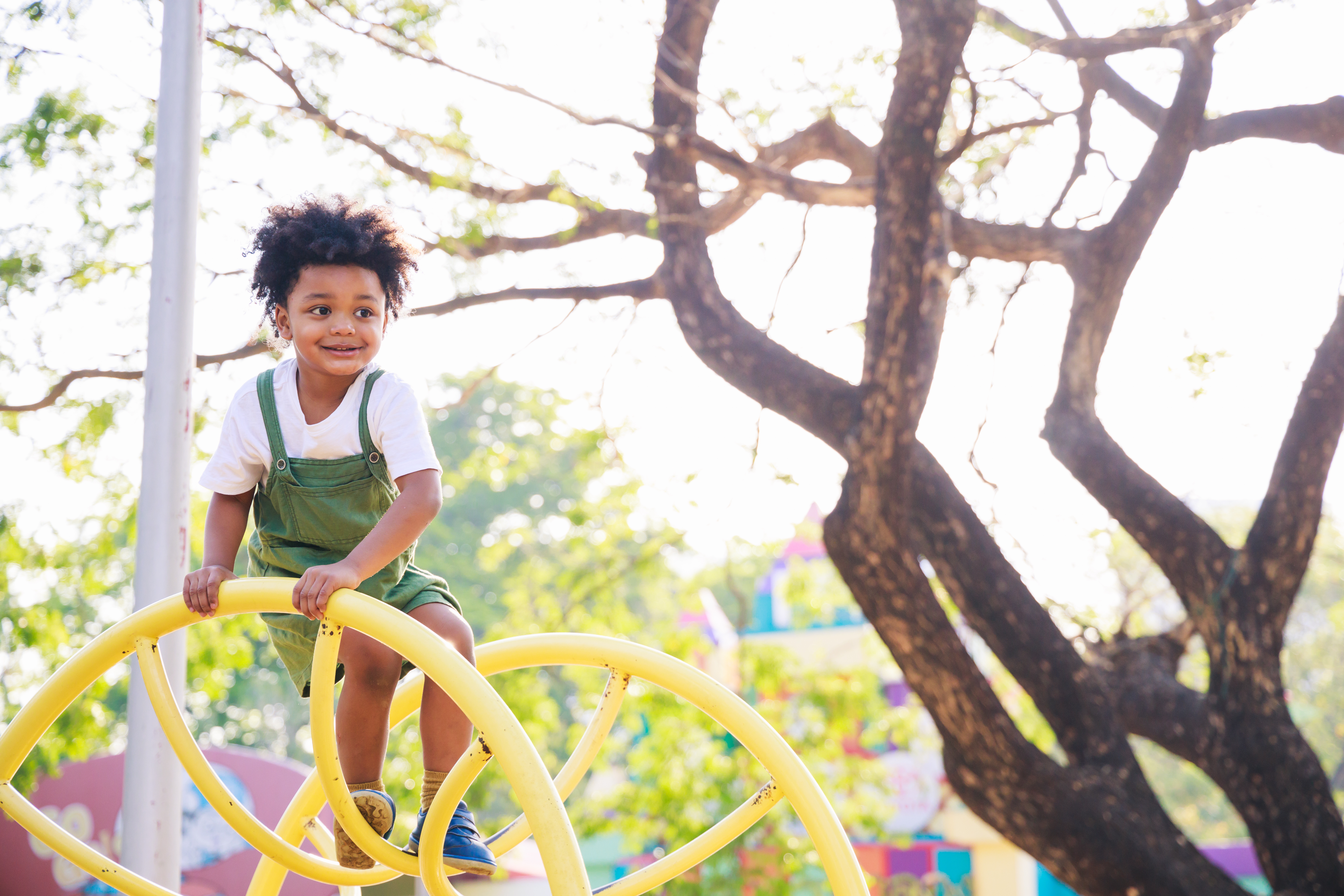 a child plays on a playground