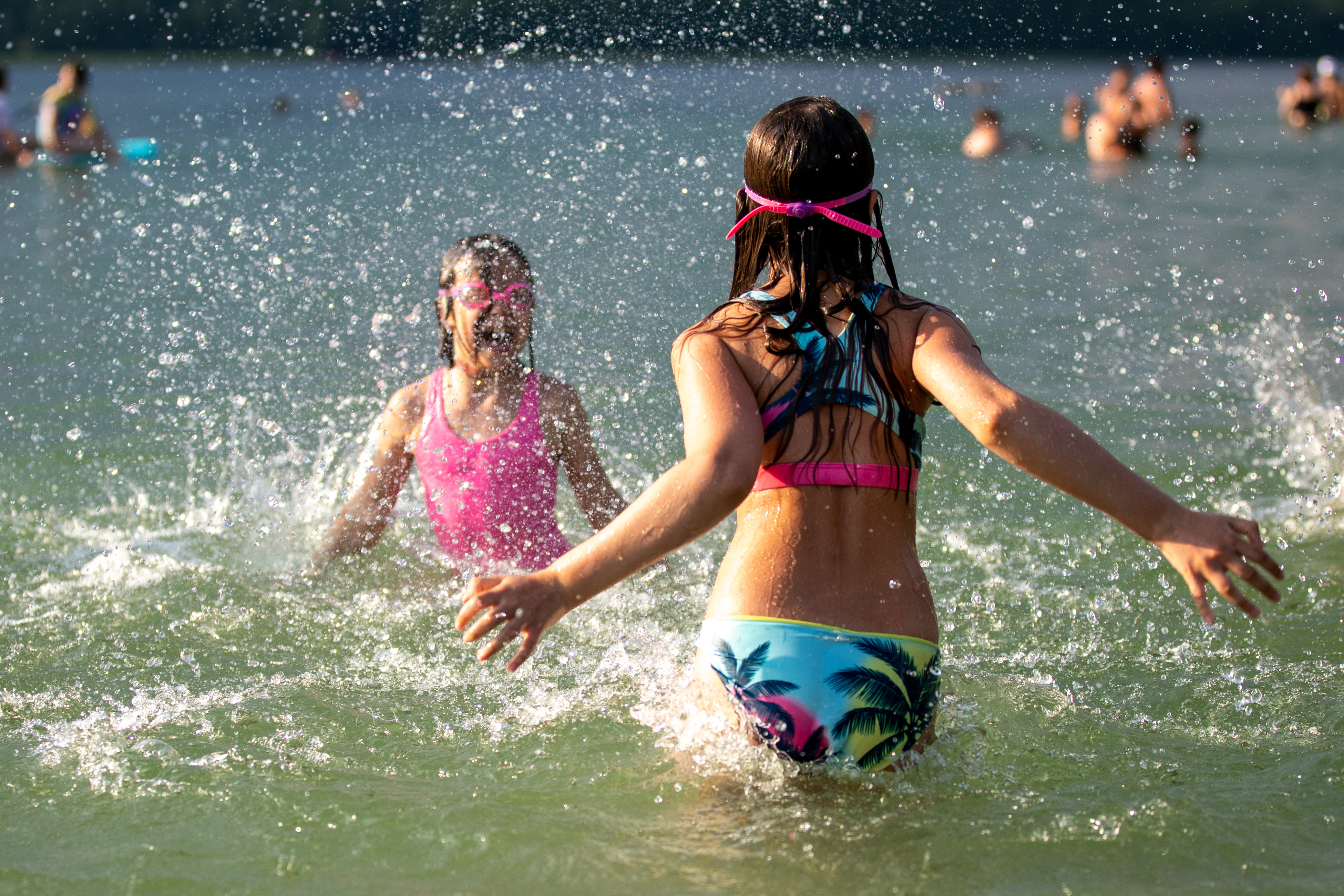 Children splash and play in water
