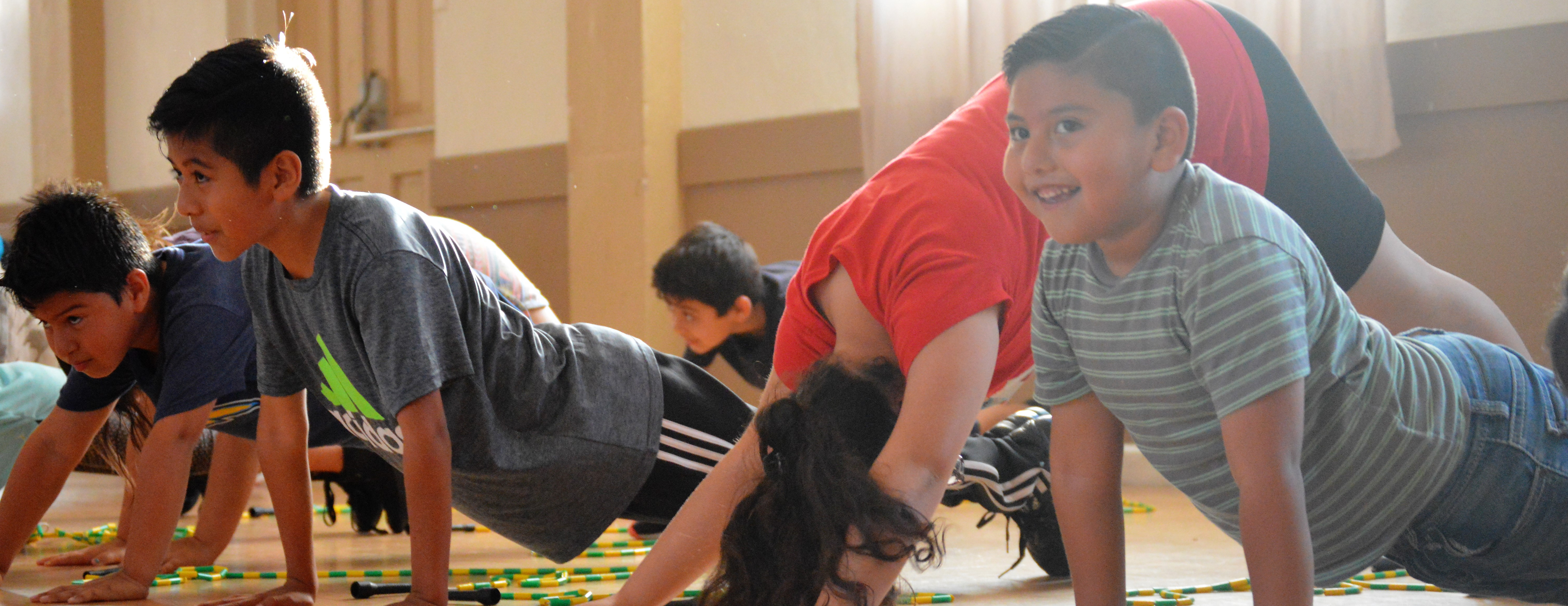 kids stretch at jump rope practice